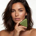 Woman with voluminous hair holding a green triangular Korean Scalp Revival Bar
